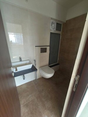 Bathroom in 2 BHK Apartment at Omkar Signet, Malad East – for Rent