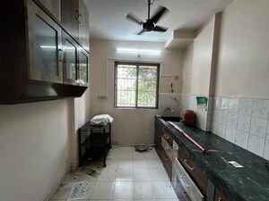 Kitchen in 1 BHK Apartment at JVM Aroma, Kasarvadavali – for Rent