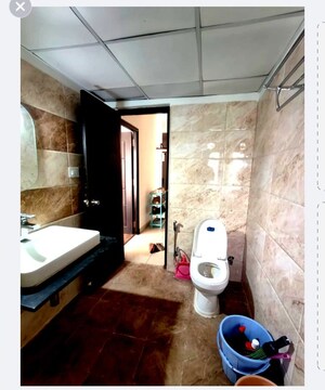 Bathroom in 3 BHK Apartment at Ananda The Ozone Heights, Tellapur – for Rent