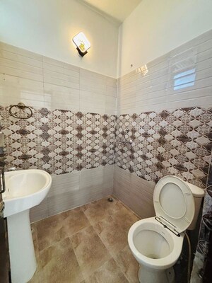 Bathroom in 3 BHK Builder Floor at Guru Nanak Enclave, Dhakoli – for Sale