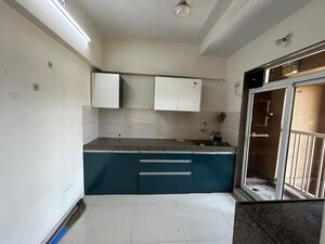 Kitchen in 2 BHK Apartment at Happy Valley, Manpada – for Rent