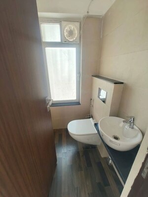 Bathroom in 1 BHK Apartment at Omkar Signet, Malad East – for Rent