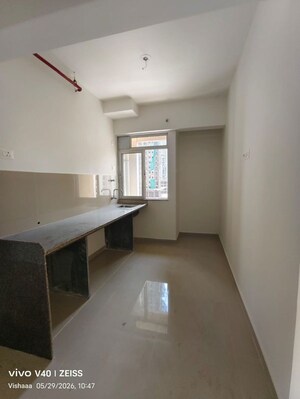 Kitchen in 1.5 BHK Apartment at Puranik Tokyo Bay Phase 2A, Kasarvadavali – for Rent
