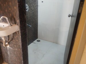 Bathroom in 1 BHK Apartment at Saha Alpine, Kharghar – for Rent