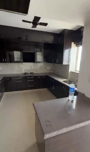 Kitchen in 4 BHK Apartment at CHD Avenue 71, Sector 71 – for Rent