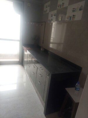 Kitchen in 3.5 BHK Apartment at Omkar Alta Monte, Malad East – for Sale