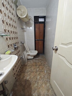 Bathroom in 2 BHK Apartment at MM Spectra, Chembur – for Rent