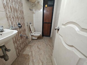 Bathroom in 2 BHK Apartment at MM Spectra, Chembur – for Rent