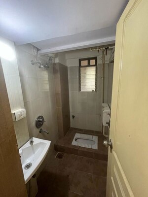 Bathroom in 1 BHK Apartment at Mitha Nagar – for Rent