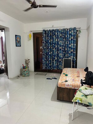 Living Room in 2 BHK Apartment at Wadgaon Sheri – for Rent