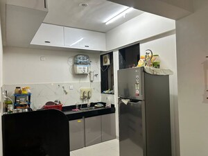 Kitchen in 2 BHK Apartment at Wadgaon Sheri – for Rent