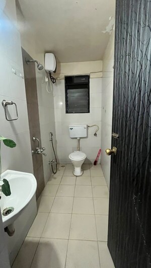 Bathroom in 1 BHK Apartment at Wadgaon Sheri – for Rent