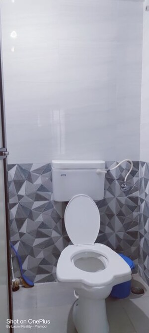 Bathroom in 1 BHK Apartment at Matru Aashish, Parel – for Rent