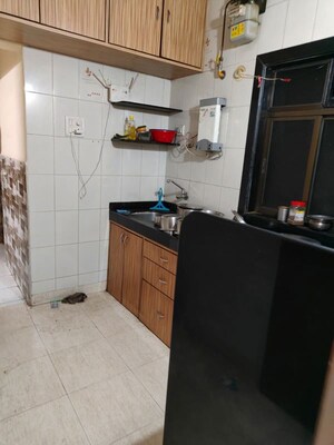 Kitchen in 2 BHK Apartment at Chamunda Shreeji Enclave, Kharghar Sector 13 – for Sale