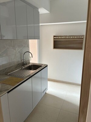 Kitchen in 3 BHK Apartment at DLF Gardencity Enclave, Sector 93 – for Rent