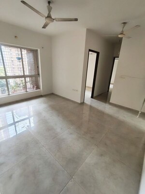 Living Room in 2 BHK Apartment at Lodha Amara, Kolshet Road – for Rent
