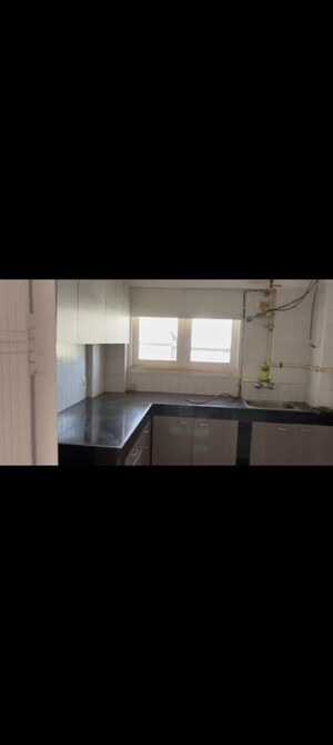 Kitchen in 3 BHK Apartment at Sanjeev Enclave, Andheri West – for Rent