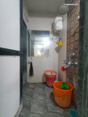 Bathroom in 1 BHK Apartment at Puranik City, Kasarvadavali – for Rent