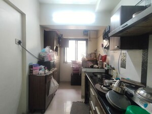Kitchen in 1 BHK Apartment at Puranik City, Kasarvadavali – for Rent