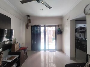 Living Room in 1 BHK Apartment at Puranik City, Kasarvadavali – for Rent