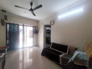 Living Room in 1 BHK Apartment at Puranik City, Kasarvadavali – for Rent