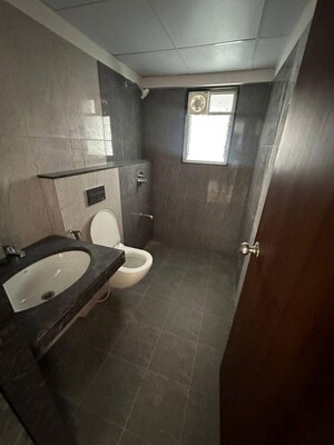 Bathroom in 3 BHK Apartment at Gera World of Joy, Kharadi – for Rent