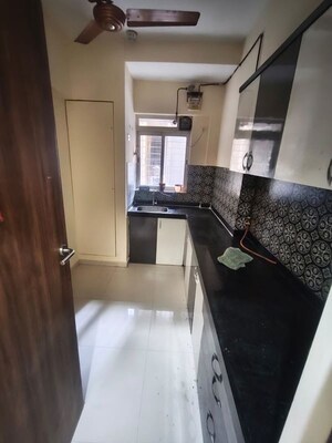 Kitchen in 2 BHK Apartment at Lodha Amara, Kolshet Road – for Rent