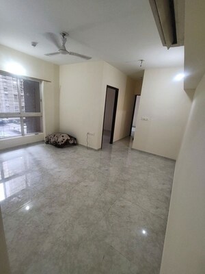 Living Room in 2 BHK Apartment at Lodha Amara, Kolshet Road – for Rent