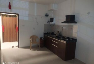 Kitchen in Studio Apartment at Gera World of Joy, Kharadi – for Rent