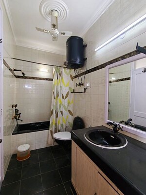 Bathroom in 3 BHK Builder Floor at Sarvodaya Enclave – for Rent