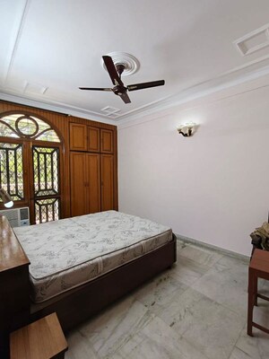 Bedroom in 3 BHK Builder Floor at Sarvodaya Enclave – for Rent