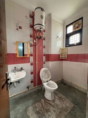 Bathroom in 2 BHK Builder Floor at Kalkaji – for Rent
