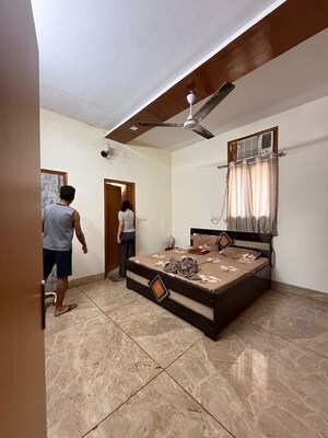 Bedroom in 2 BHK Builder Floor at Nehru Enclave – for Rent