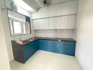 Kitchen in 2 BHK Apartment at Ashar Axis, Majiwada – for Rent