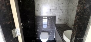 Bathroom in 2 BHK Apartment at Ajmera Boulevard, Malad West – for Rent