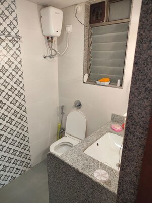 Bathroom in 2 BHK Apartment at Gagangiri Elanza CHS, Mulund East – for Rent