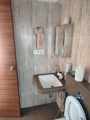 Bathroom in 2 BHK Apartment at Gagangiri Elanza CHS, Mulund East – for Rent