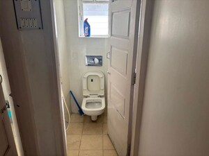 Bathroom in 2 BHK Apartment at Banu Apartment, Camp – for Rent