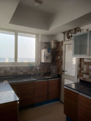 Kitchen in 4 BHK Apartment at Jaypee Greens Kalypso Court, Sector 128 – for Rent