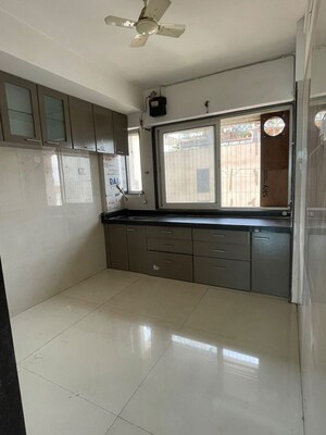 Kitchen in 2 BHK Apartment at Chamunda Serene, Seawoods – for Rent