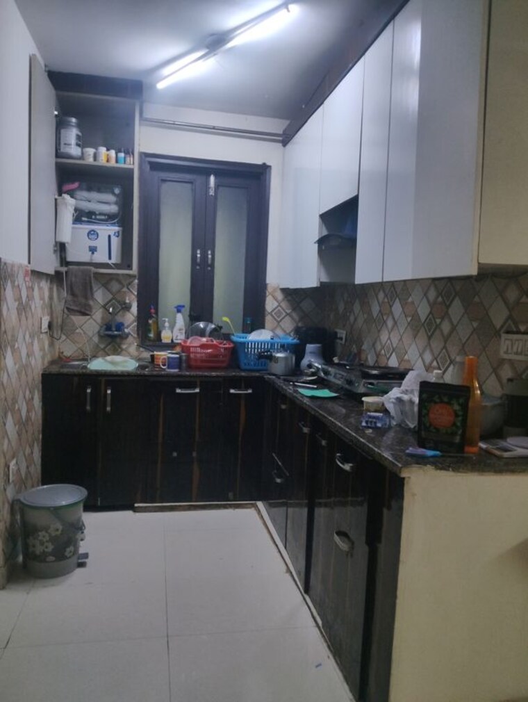 Kitchen, suncity-township-gurgaon 3 Bedroom 1350 Sq.Ft. Builder Floor In Sector 54 Gurgaon 10428070