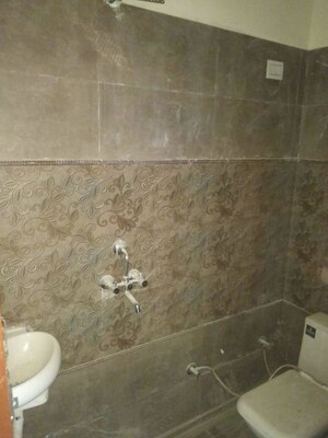 Bathroom in 2 BHK Builder Floor at Arsh Eco Home, Gaur City 1 – for Rent