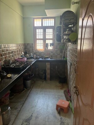 Kitchen in 3 BHK Apartment at Vivek Vihar Colony – for Sale