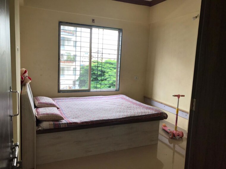 Bedroom, kk-angels 2 Bedroom 950 Sq.Ft. Apartment In Rahatani Pune 10428188