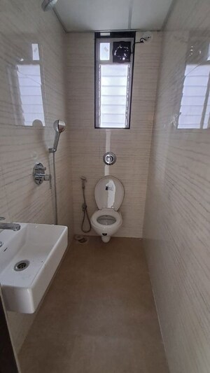 Bathroom in 1 BHK Apartment at Gold Star Heritage Heights, Matunga East – for Rent