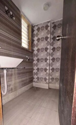 Bathroom in 1 BHK Apartment at Dharti Orange Heights, Morya Nagar – for Rent