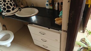Bathroom in 2 BHK Apartment at Unitech Uniworld Gardens 2, Sector 47 – for Rent