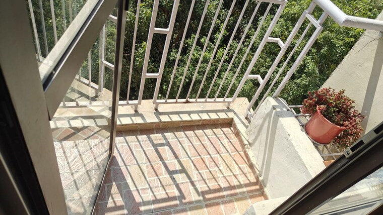 Balcony, unitech-uniworld-gardens-2 2 Bedroom 1050 Sq.Ft. Apartment In Sector 47 Gurgaon 10428455