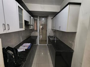 Kitchen in 3 BHK Apartment at Amrapali Silicon City, Sector 76 – for Rent