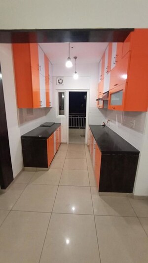 Kitchen in 2.5 BHK Apartment at Gulshan Vivante, Sector 137 – for Rent